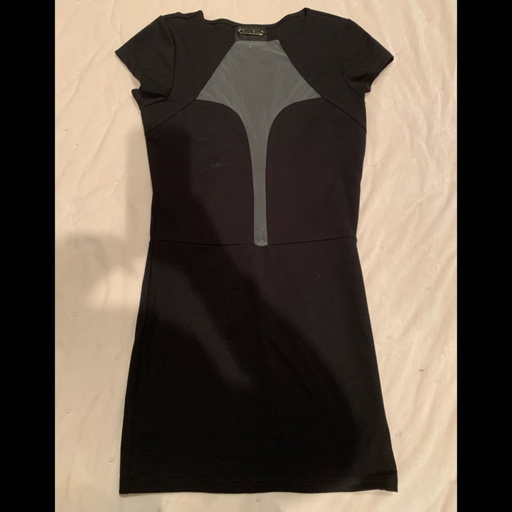 Sexy black dress with a twist